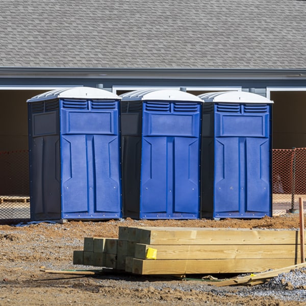 what is the cost difference between standard and deluxe portable toilet rentals in Mitchellville AR